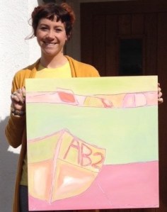 Landscape artist Sarah Nickless with one of her paintings